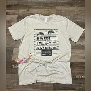 When it comes to my kids I will smile in my mugshot shirt
